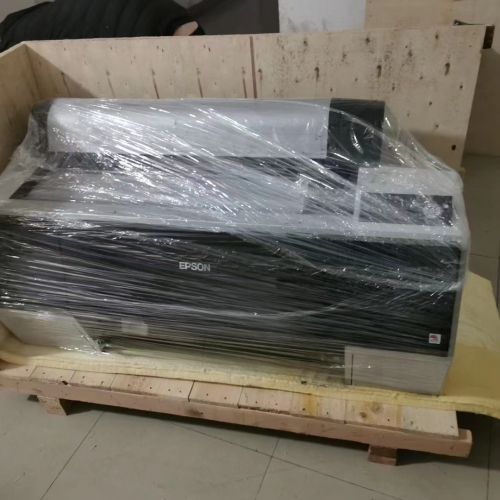 再來一臺菲林打印機打包發貨，遠程安裝